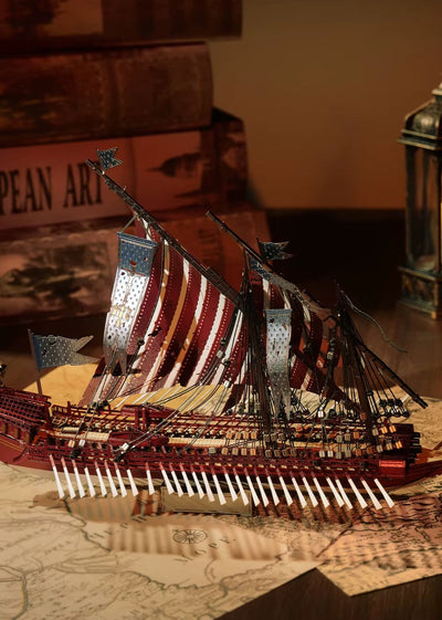 Puzzle 3D Galère de Guerre exposé près de livres anciens